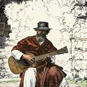 Gaucho playing his guitar, Argentina