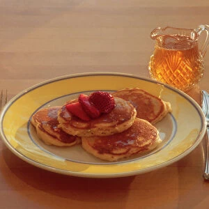 Maple syrup on homemade pancakes
