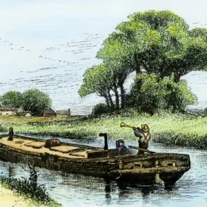 Mules towing a barge on the Erie Canal