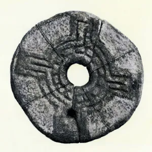 Sun-wheel on a Celtic quern, Ireland