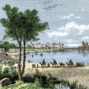 Hand-colored woodcut Print of a Camel caravan approaching Sidon