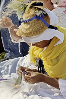 African-American woman reenactor in a sewing circle at Yorktown