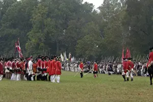 Formation Prints: American, French, and British armies on the field in a reenactment of the surrender at Yorktown Battlefield