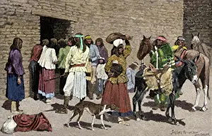 Apaches receiving beef rations from Indian agents at San Carlos Reservation