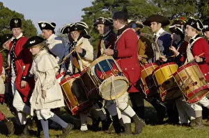 Formation Prints: British fife and drum corps marching in a reenactment at Yorktown battlefield