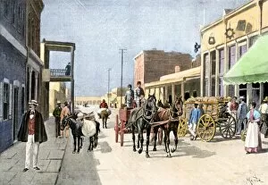South West Gallery: Busy street in Santa Fe in the late 1800s