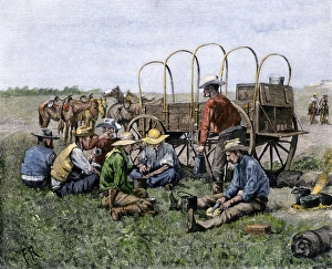 Chuck wagon serving cowboys their midday meal