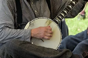 Images Dated 9th April 2011: Civil War musician playing a banjo