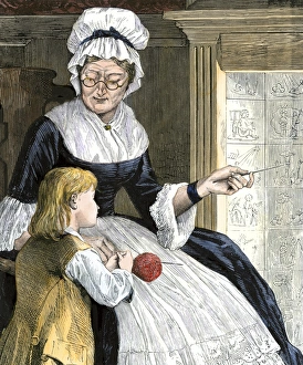 Reading Gallery: Colonial boy learning to read at home