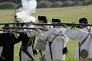 Formation Prints: Continental Army reenactors firing their muskets at Yorktown battlefield