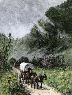 Kentucky Prints: Covered wagon coming through Cumberland Gap on the Wilderness Road on a misty