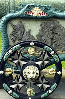 Belgian Prints: Dragons and other decorations on a medieval Belgian cannon