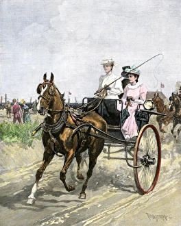 Sports:recreation Prints: Fashionable young women driving a carriage on the beach