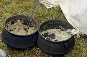 Grits cooked in kettles to feed Continental Army reenactors