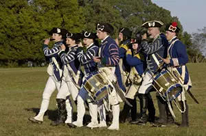 Formation Prints: Loyalist colonials marching in a reenactment on the Yorktown battlefield