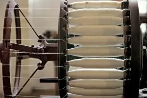 Cotton Gallery: Machine-spun thread on a bobbin in the Lowell mills