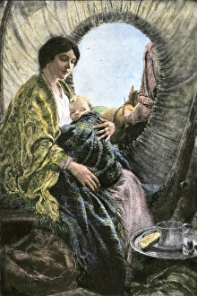 Pioneer Prints: Madonna of the prairies- a mother and child inside a covered wagon
