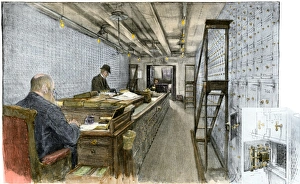 Main room of a bank vault with walls of safe-deposit boxes