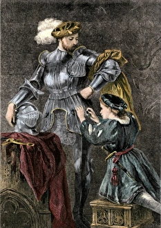 Armour Gallery: Medieval squire helping a knight into his armor