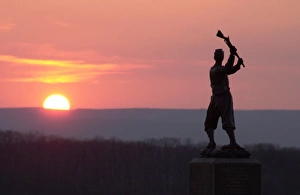 Conflict Prints: Memorial statue of a Civil War soldier on Cemetery Ridge at sunset