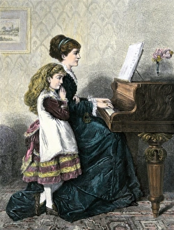 Mother entertaining her daughter at the piano