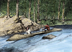Native Americans in a dugout canoe on the Columbia River