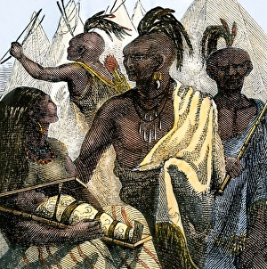 Native Americans of the Flathead tribe flattening a babys head in a cradleboard
