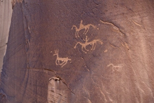 Native Americans on horseback petroglyph