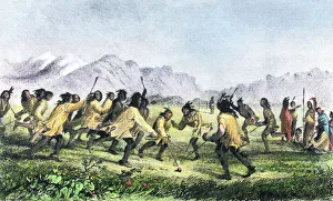 Native Americans playing a game of lacrosse with a ball and sticks