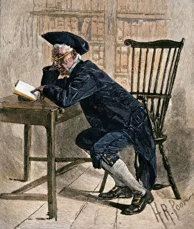 Desk Gallery: Philadelphia colonist reading in the old library, 1700s