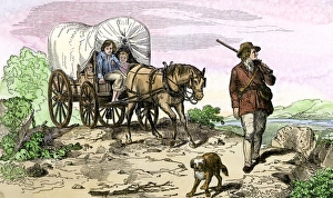 Dakotas Prints: Pioneer family moving west in a covered wagon