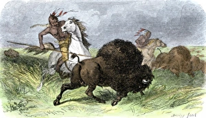 Plains Indians on horseback hunting buffalo