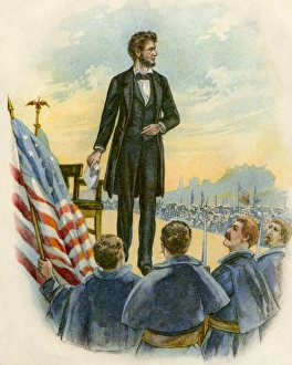 President Lincoln giving his speech at the Gettysburg battlefield during