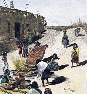 Fire Prints: Pueblo women firing pottery