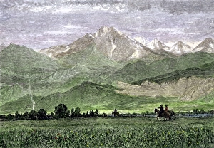 Montana Prints: Rocky Mountains with horseback riders in a valley