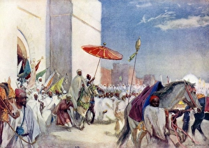 A royal procession of Sultan Abd al- Aziz IV in Morocco