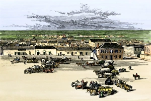 <b class=qtipBold><figcaption>San Antonio, Texas, 1800s</figcaption></b><br>Wagons in the plaza of San Antonio, Texas, about 1890. Hand-colored woodcut of a 19th-century illustration<br><em>© North Wind Picture Archives</em> San Antonio, Texas, 1800s