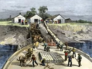 Steamboat taking on cargo, Mississippi river, 1800s