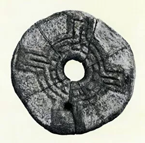 Carved Gallery: Sun-wheel on a Celtic quern, Ireland