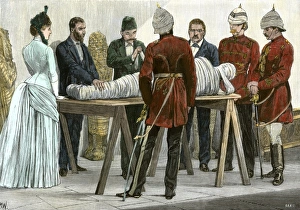 Archaeologist Gallery: Unwrapping an Egyptian mummy, Cairo, 1880s