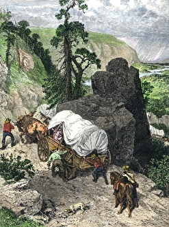 Montana Prints: Wagon train crossing the mountains