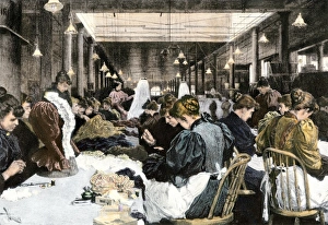 Women garment workers in the dressmaking department of a factory