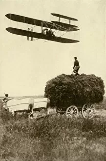 French history Collection: Wright airplane over a French farm