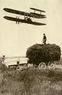 Farm Gallery: Wright airplane over a French farm
