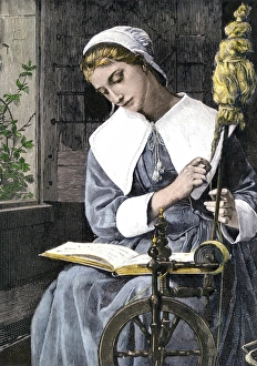 Young Puritan woman reading while spinning at her wheel