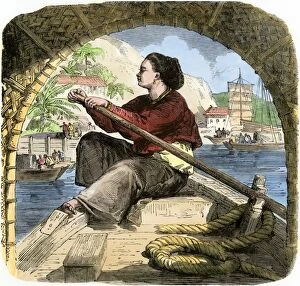 Chinese Collection: Young woman in Canton rowing a sampan